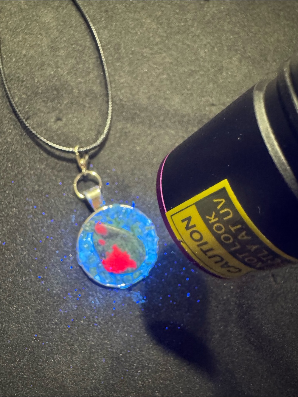 Handmade peridot and rubionite stone uv reactive pendant charm with free chain